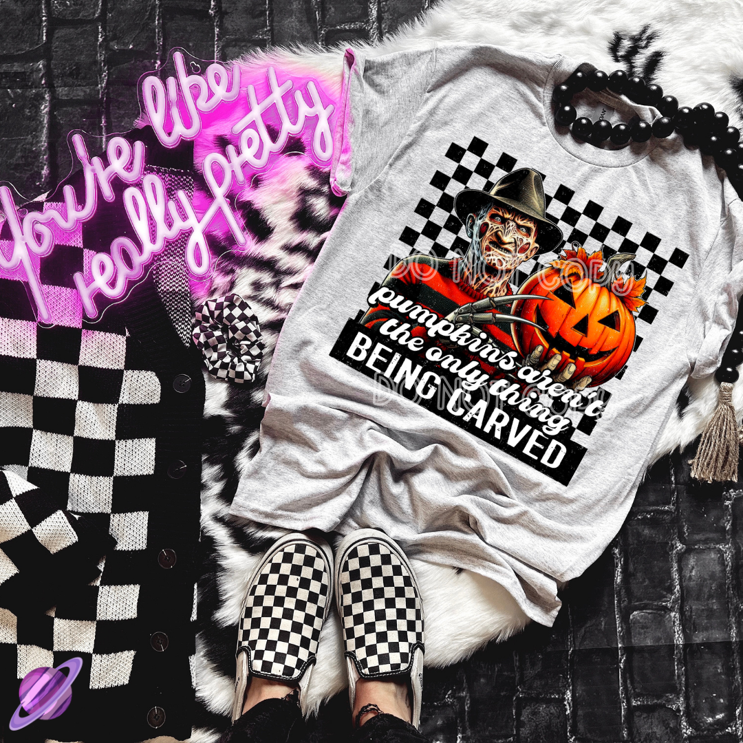 BEING CARVED FRED TEE